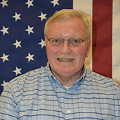 041-175w Jerry Cotter portrait with American flag background