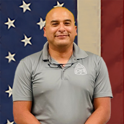 Andy_Flag_400sq Andy smiling in front of the American flag